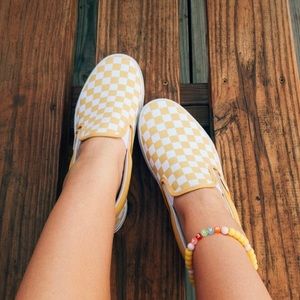 Vans yellow check slip on